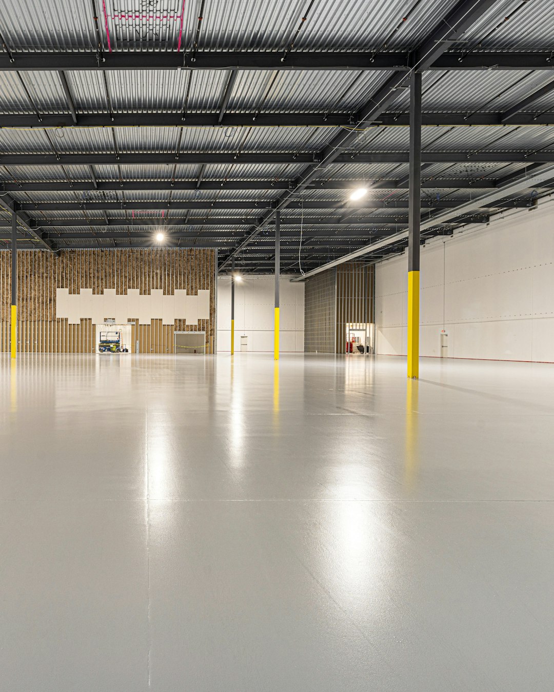 Spacious hall with a clean, polished concrete floor